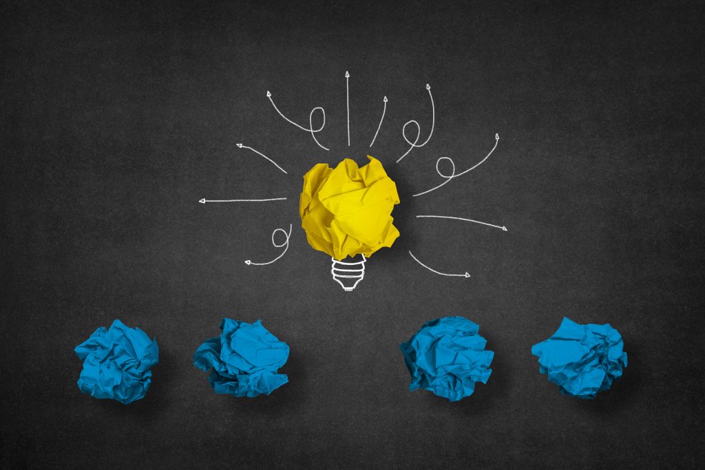 light-bulb-made-from-yellow-paper-ball-other-blue-balls